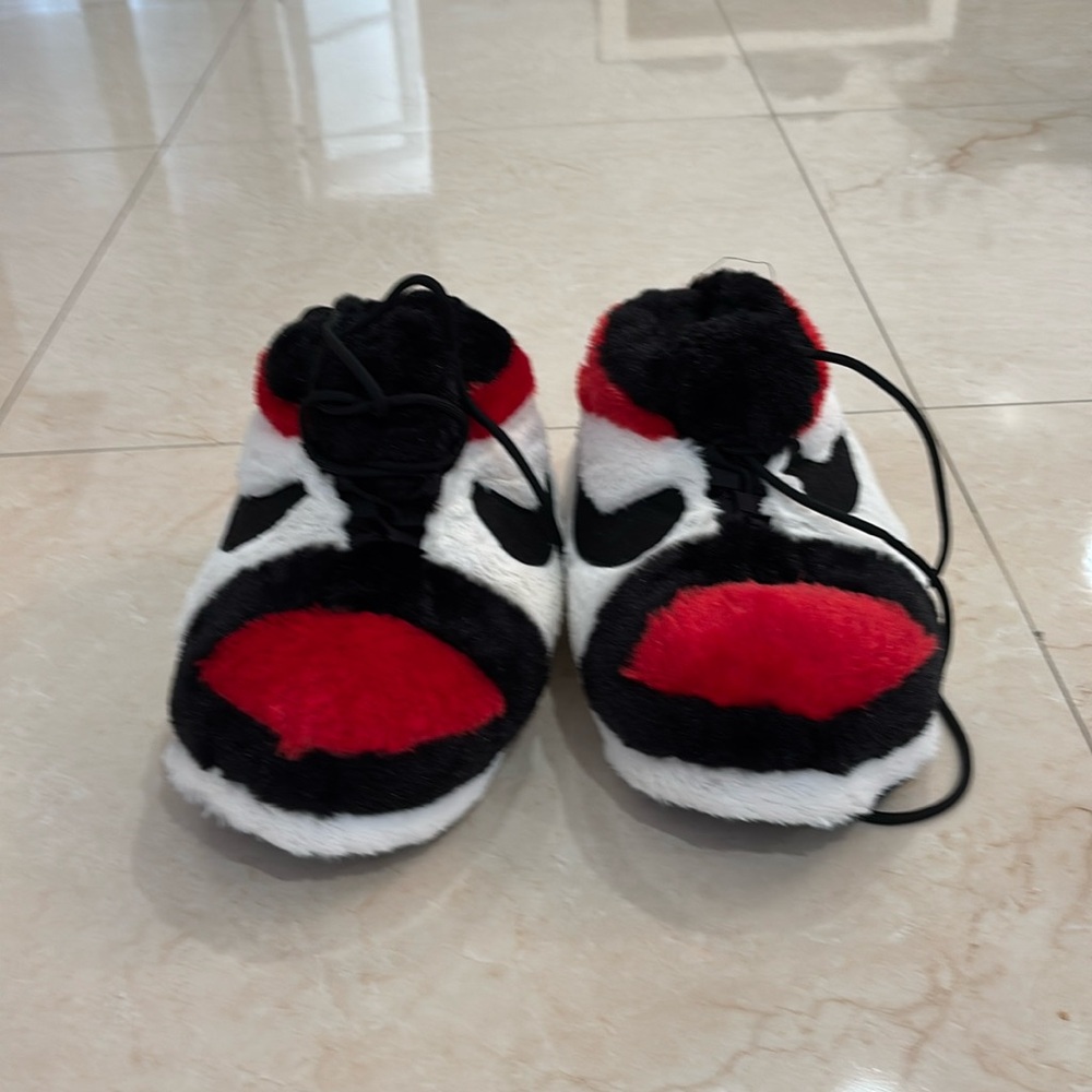 Read and black air Jordan Nike slippers